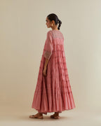Pink cotton chanderi multi-tiered kurta dress set with 3/4 sleeves, highlighted with mirror work.