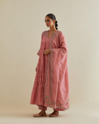 Pink cotton chanderi multi-tiered kurta dress set with 3/4 sleeves, highlighted with mirror work.