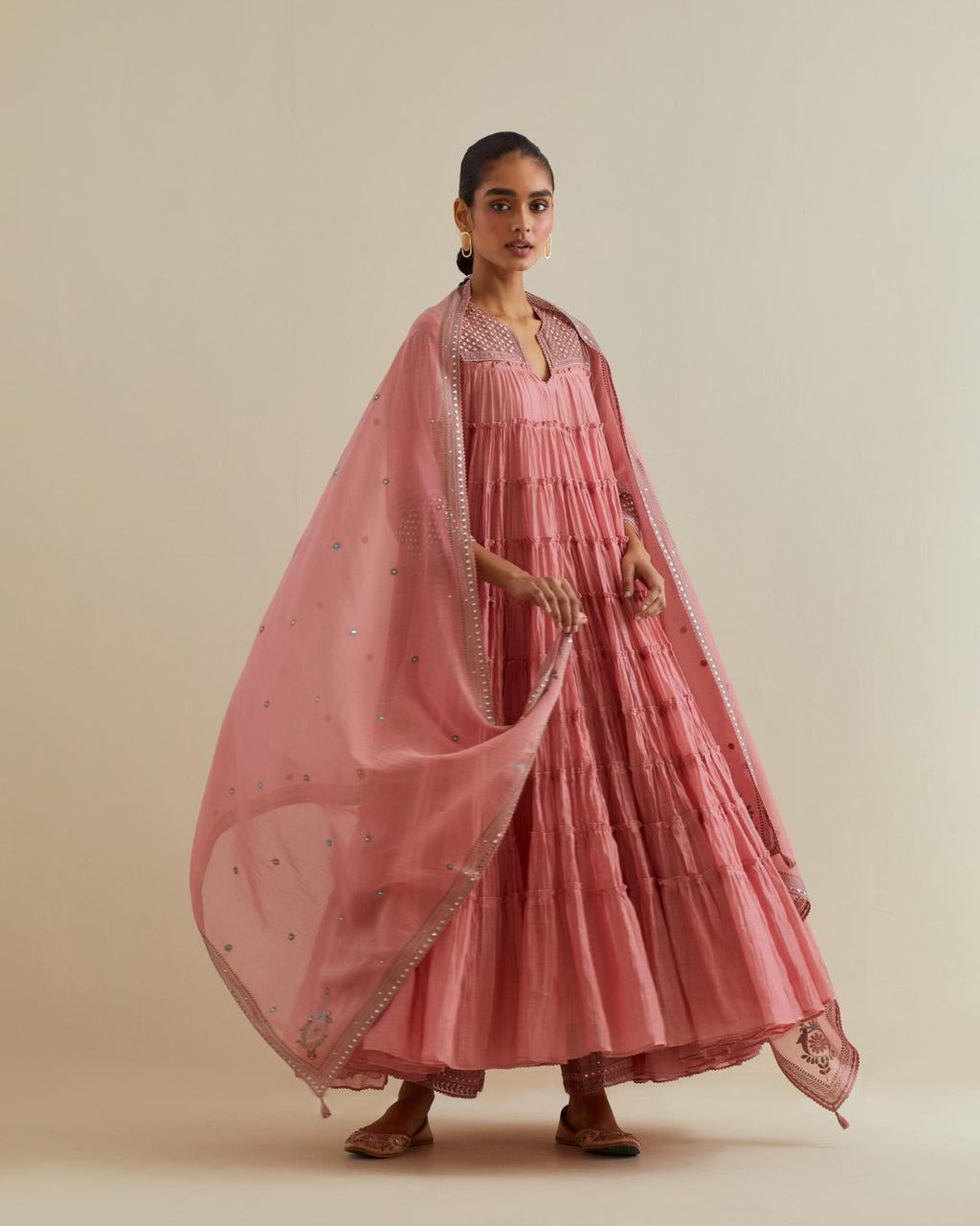 Pink cotton chanderi multi-tiered kurta dress set with 3/4 sleeves, highlighted with mirror work.