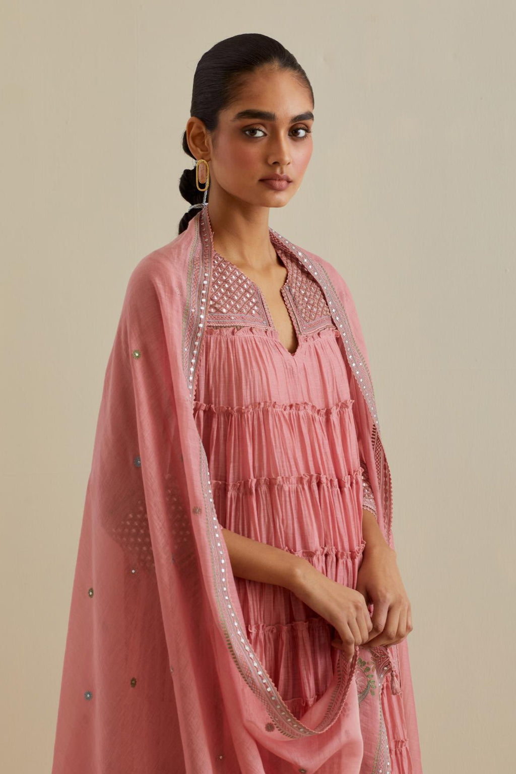 Pink cotton chanderi dupatta with delicate silk thread embroidery, highlighted with braids, mirrors and sequins work.