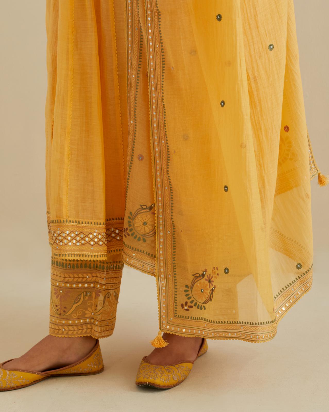 Yellow cotton chanderi kurta dress set with a V neck embroidered yoke and panels.