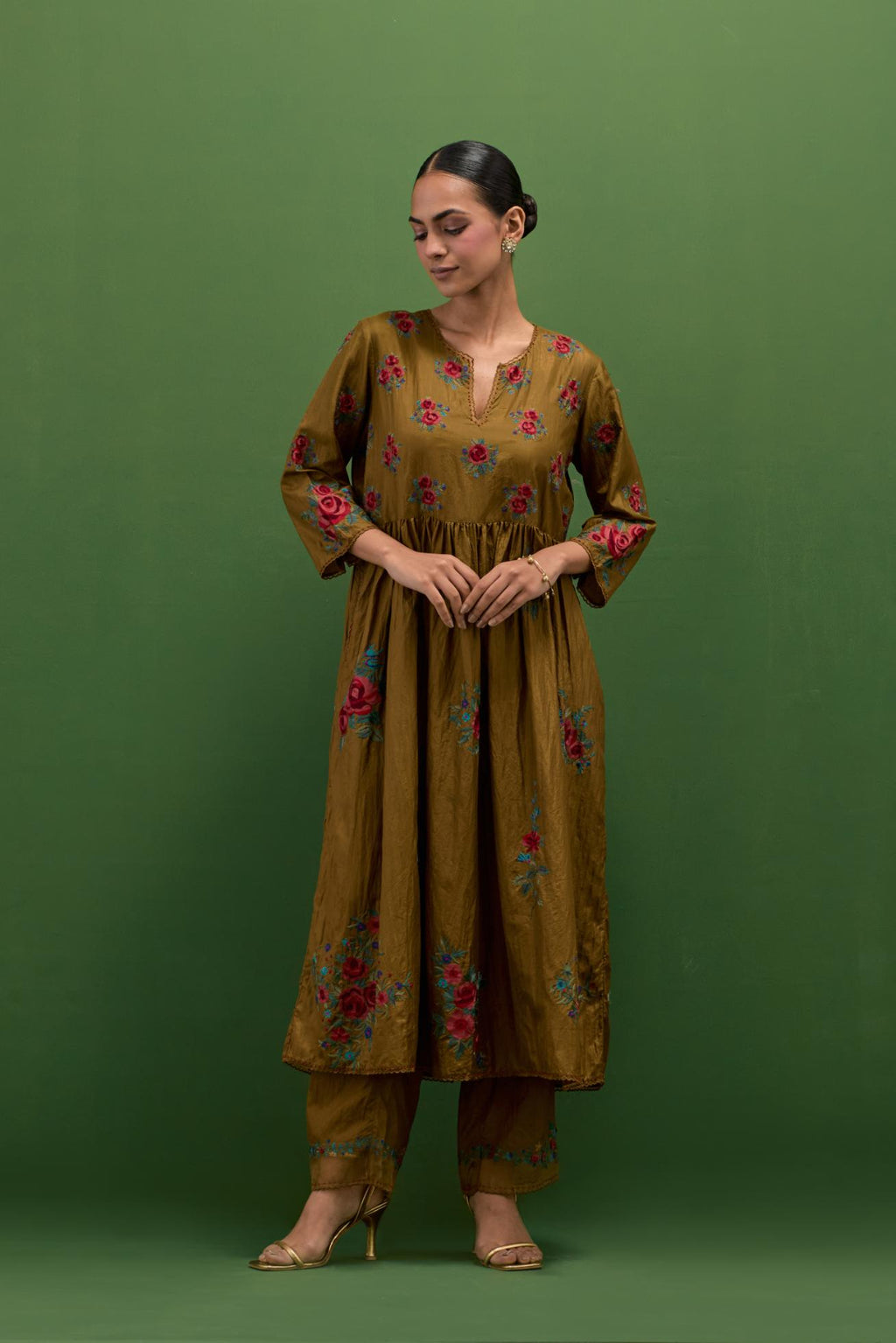 Golden olive silk Kurta dress set with all-over assorted thread embroidery floral bunches.