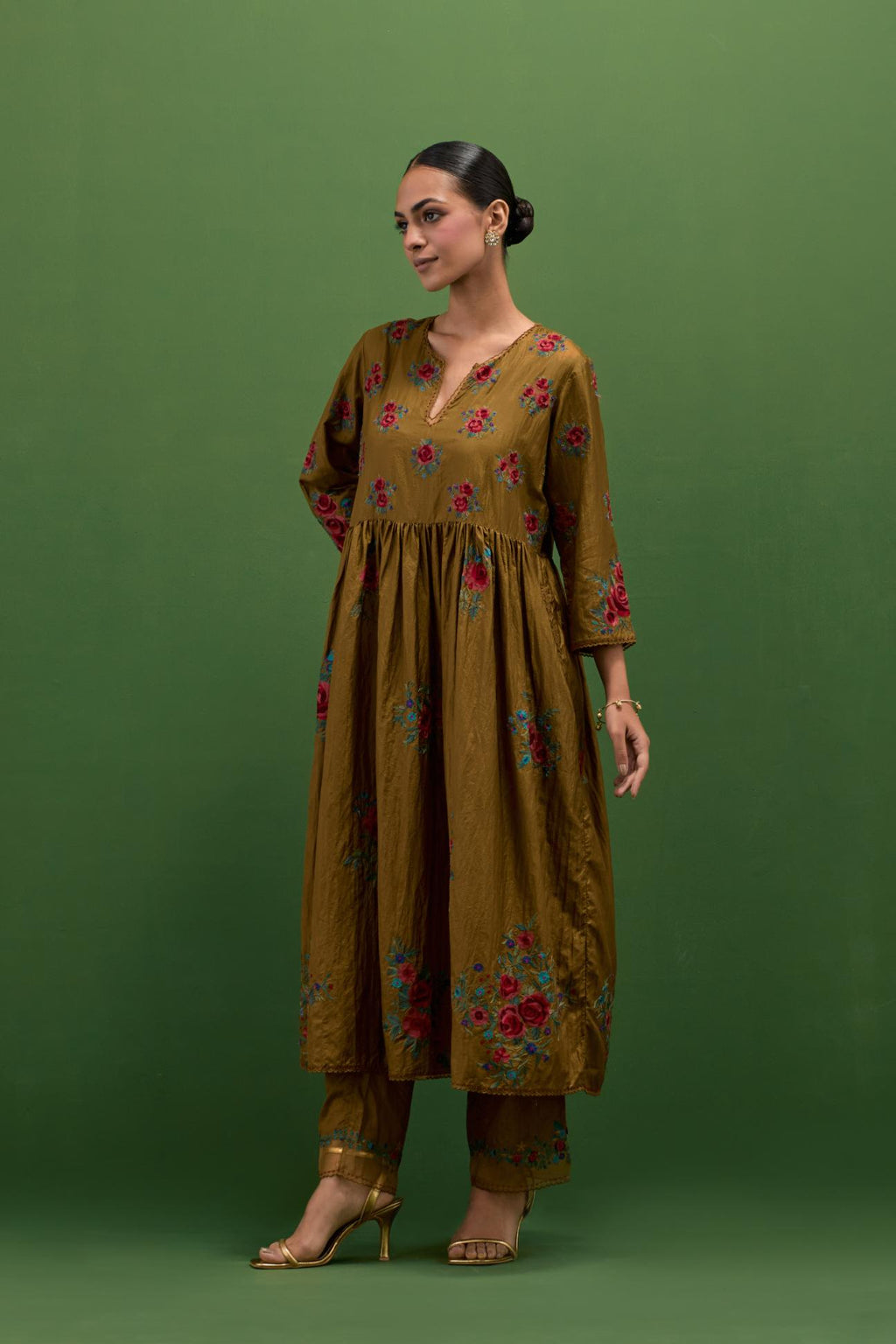 Golden olive silk Kurta dress set with all-over assorted thread embroidery floral bunches.