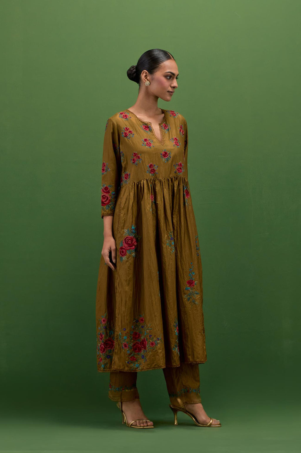 Golden olive silk Kurta dress set with all-over assorted thread embroidery floral bunches.