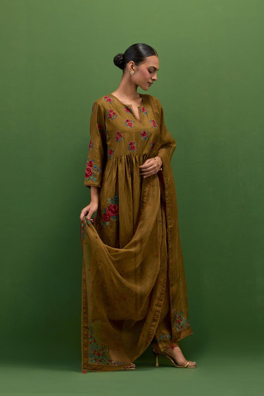 Golden olive silk Kurta dress set with all-over assorted thread embroidery floral bunches.