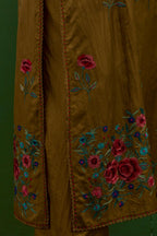 Golden olive silk straight kurta set with all-over roses embroidered in thread and scalloped organza detail at the edges.
