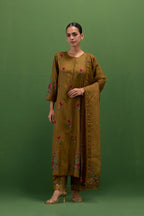 Golden olive silk straight kurta set with all-over roses embroidered in thread and scalloped organza detail at the edges.