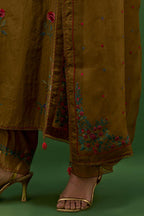 Golden olive silk straight kurta set with all-over roses embroidered in thread and scalloped organza detail at the edges.