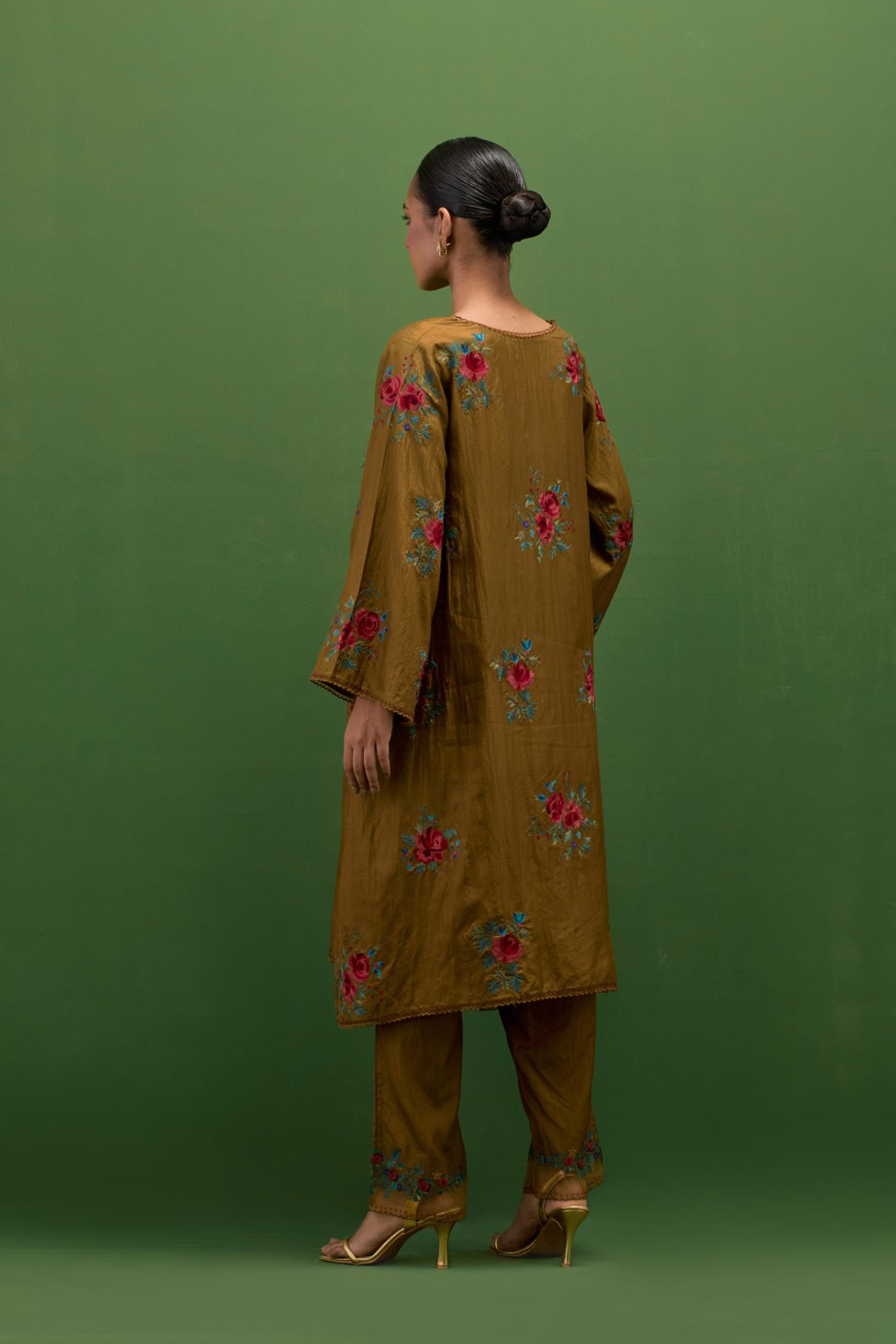 Golden olive silk A-line short kurta set, with thread embroidery roses all over.