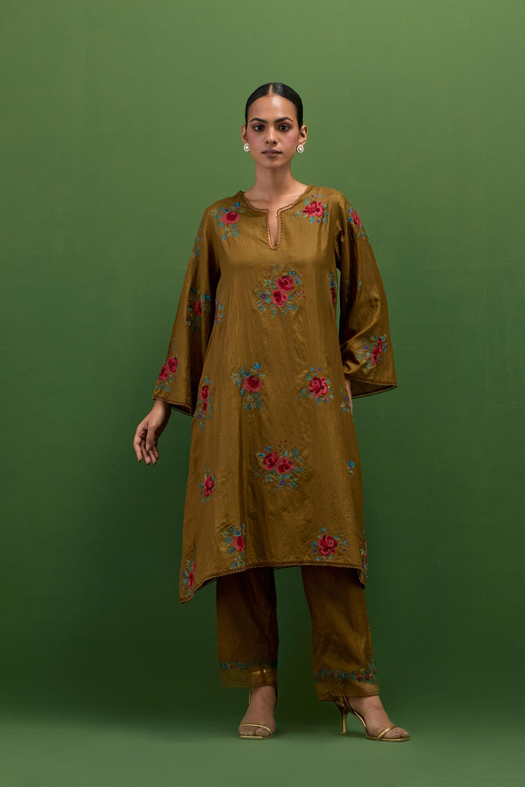 Golden olive silk A-line short kurta set, with thread embroidery roses all over.