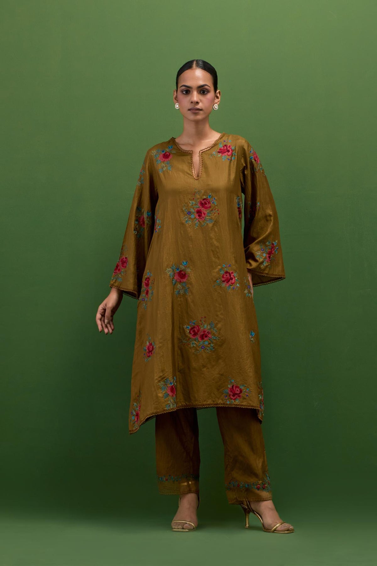 Golden olive silk A-line short kurta set, with thread embroidery roses all over.