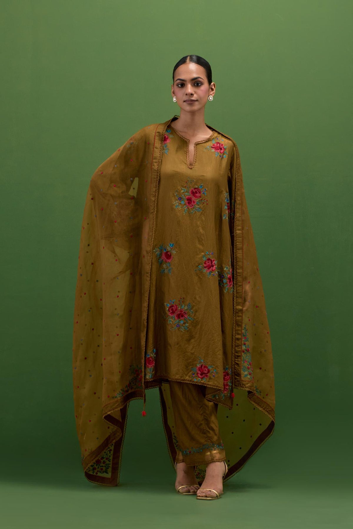 Golden olive silk A-line short kurta set, with thread embroidery roses all over.