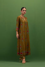 Golden olive silk straight kurta set with all-over rose embroidery and scalloped organza detail at the edges.