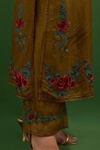 Golden olive silk straight kurta set with all-over rose embroidery and scalloped organza detail at the edges.