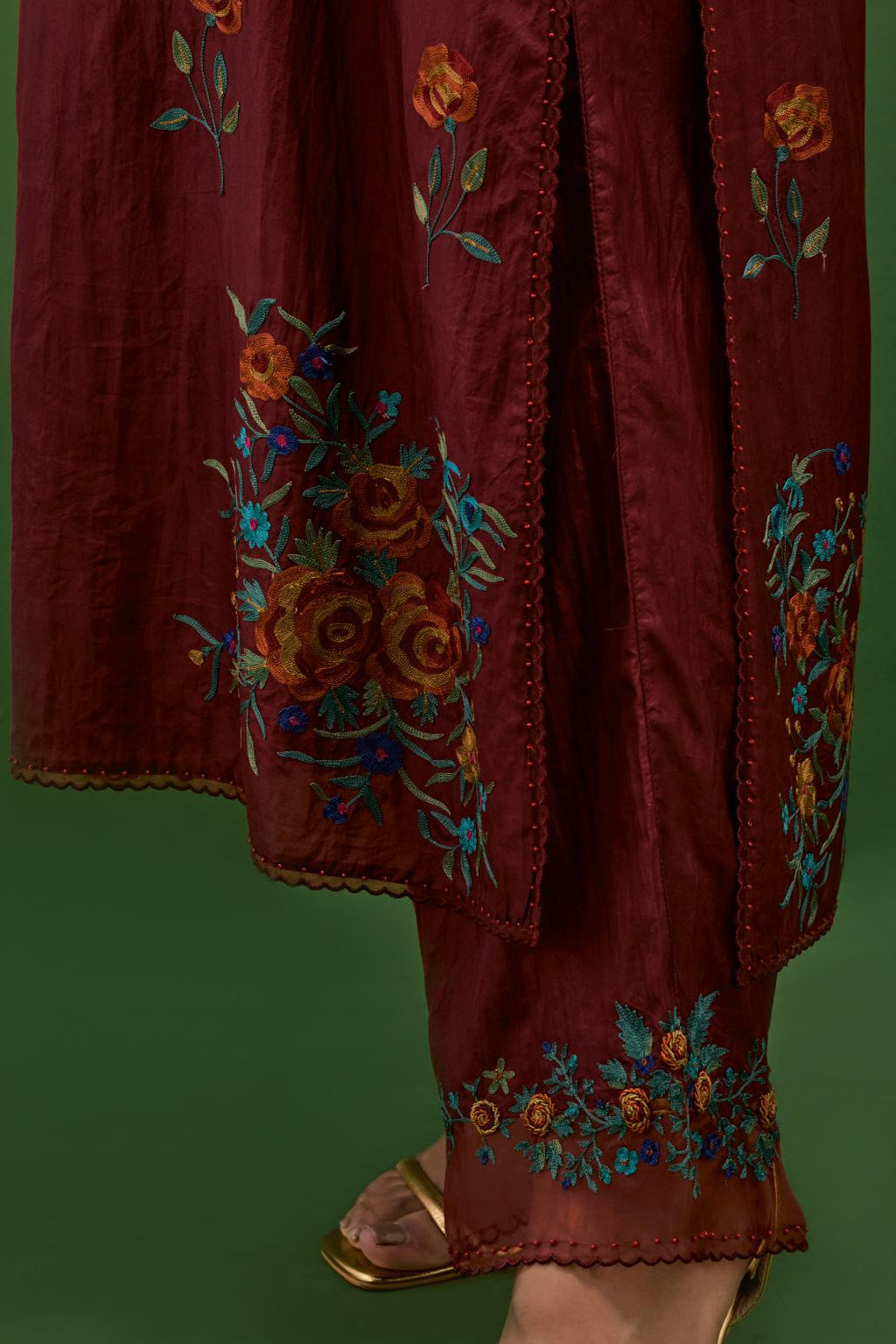 Rosewood silk straight kurta set with all-over roses embroidered in thread and scalloped organza detail at the edges.