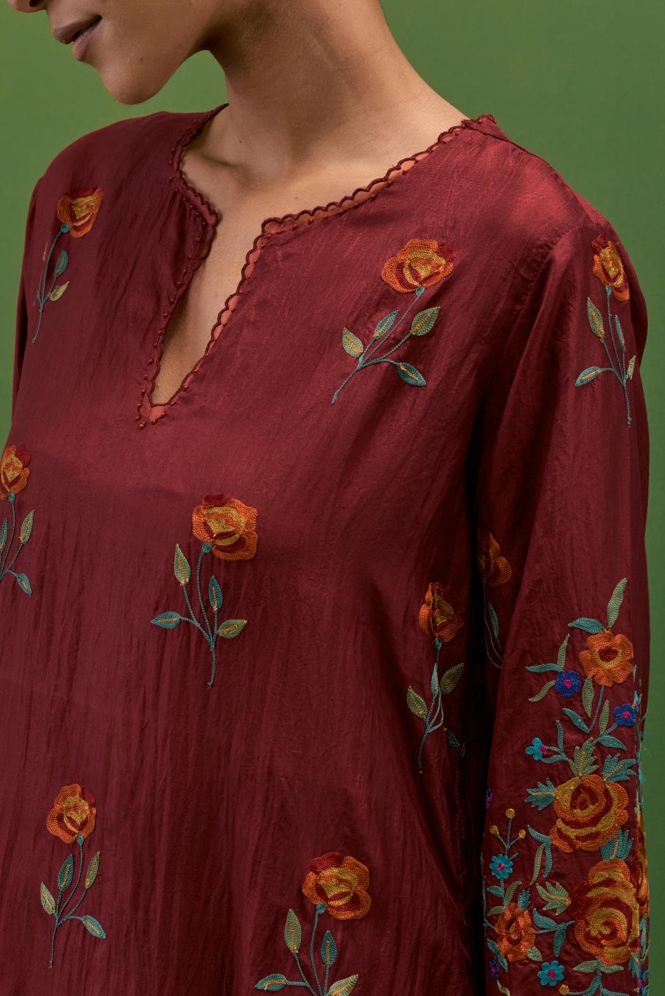 Rosewood silk straight kurta set with all-over roses embroidered in thread and scalloped organza detail at the edges.