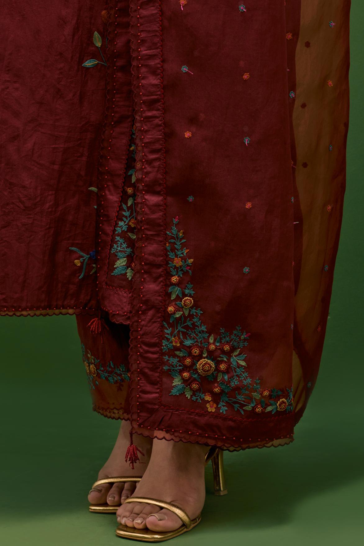 Rosewood silk straight kurta set with all-over roses embroidered in thread and scalloped organza detail at the edges.