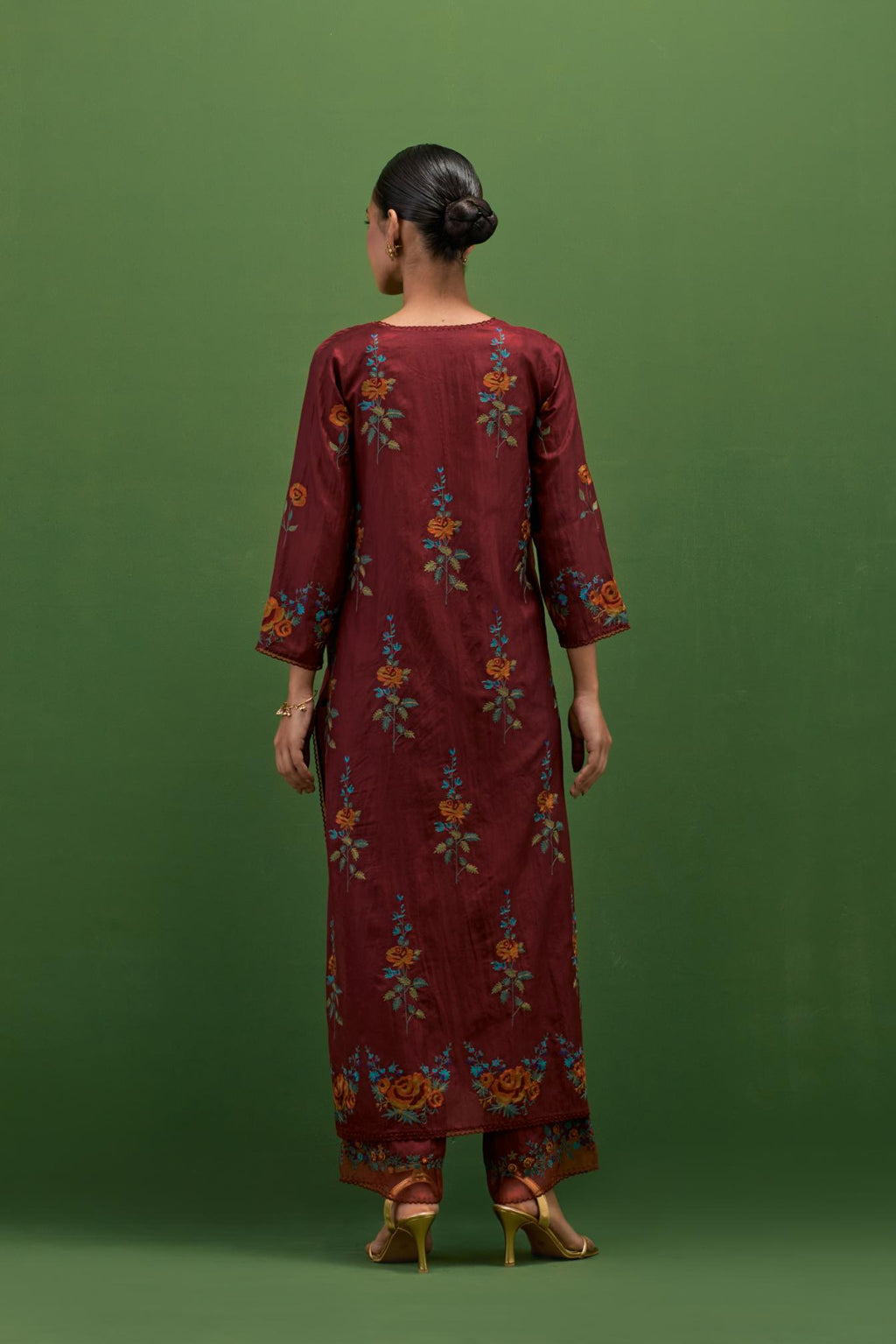 Rosewood silk straight kurta set with all-over rose embroidery and scalloped organza detail at the edges.