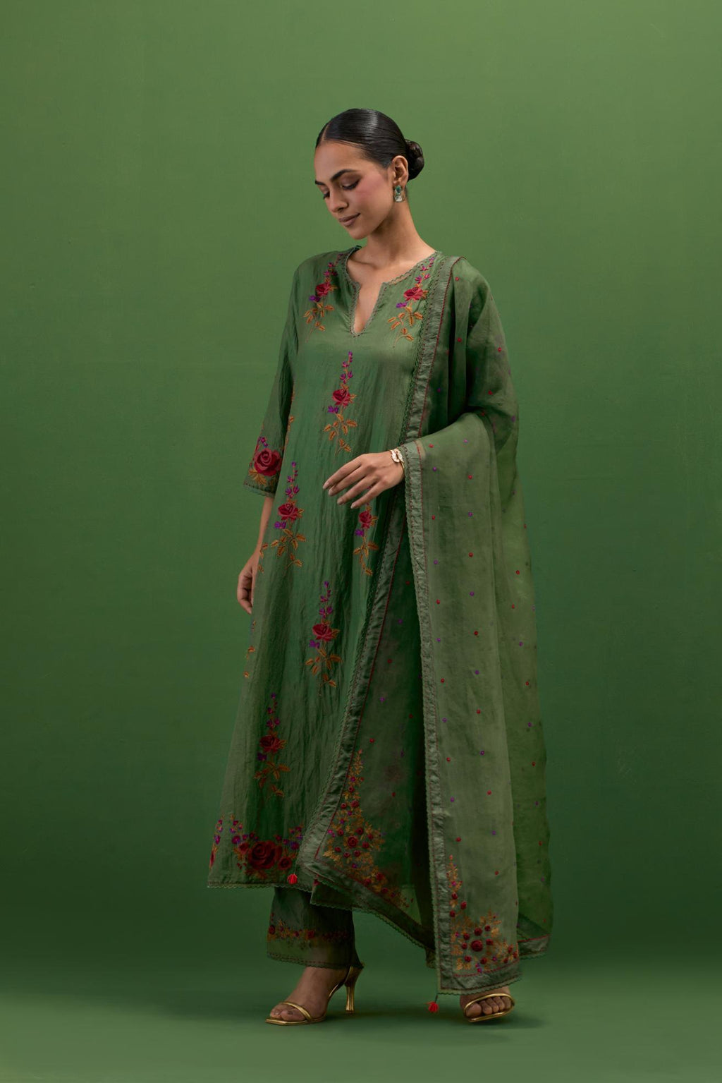 Brunswick green silk organza dupatta with a narrow silk border finished with a delicate organza scalloped edge, highlighted with contrast bead work.