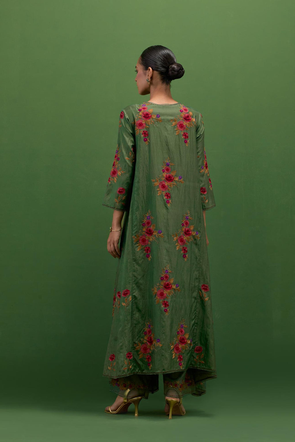 Brunswick green silk easy fit, asymmetric hem, panelled kurta set with all-over thread embroidered roses, highlighted with scalloped organza at the edges with contrast beads.