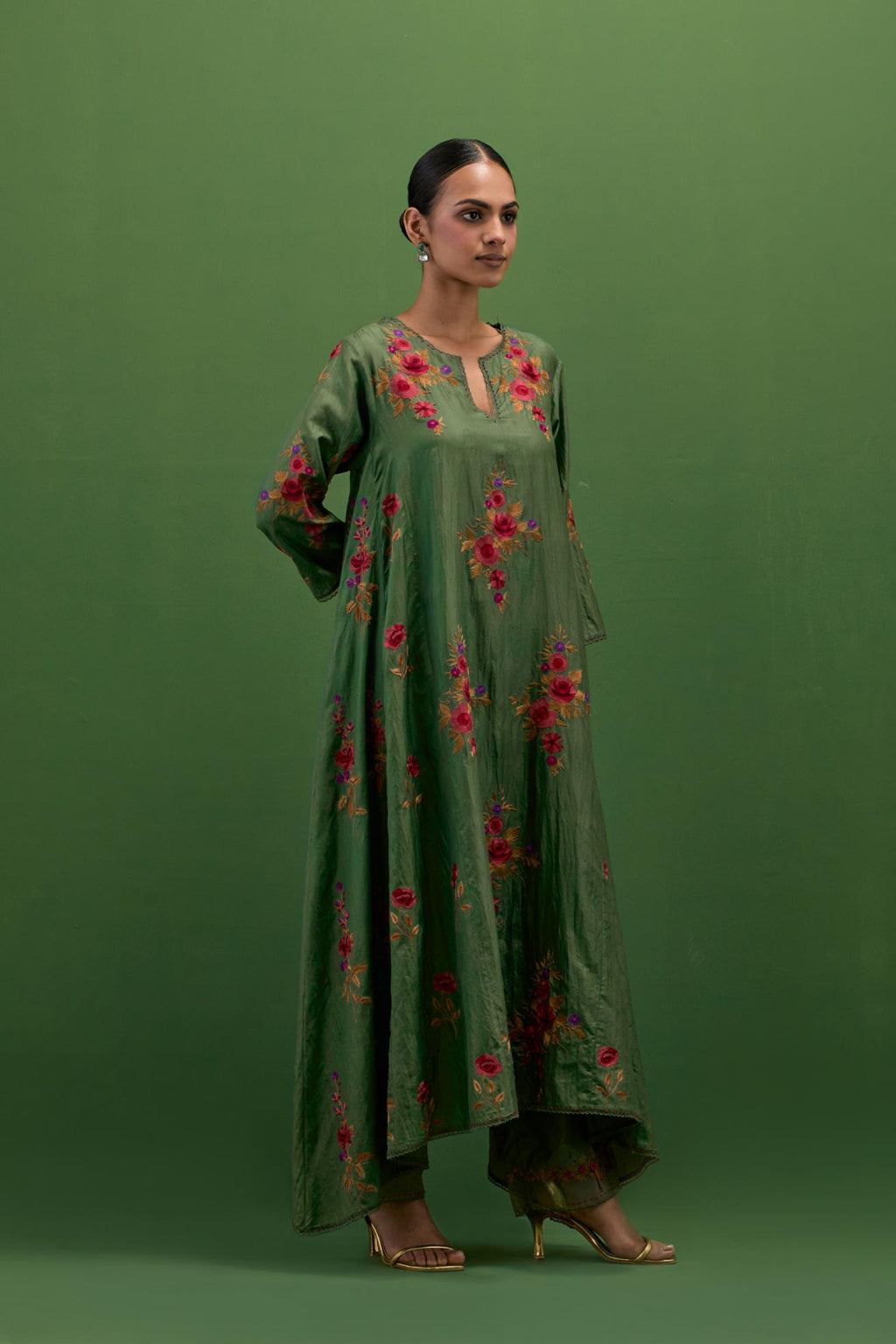 Brunswick green silk easy fit, asymmetric hem, panelled kurta set with all-over thread embroidered roses, highlighted with scalloped organza at the edges with contrast beads.