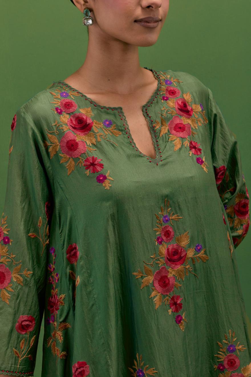 Brunswick green silk easy fit, asymmetric hem, panelled kurta set with all-over thread embroidered roses, highlighted with scalloped organza at the edges with contrast beads.