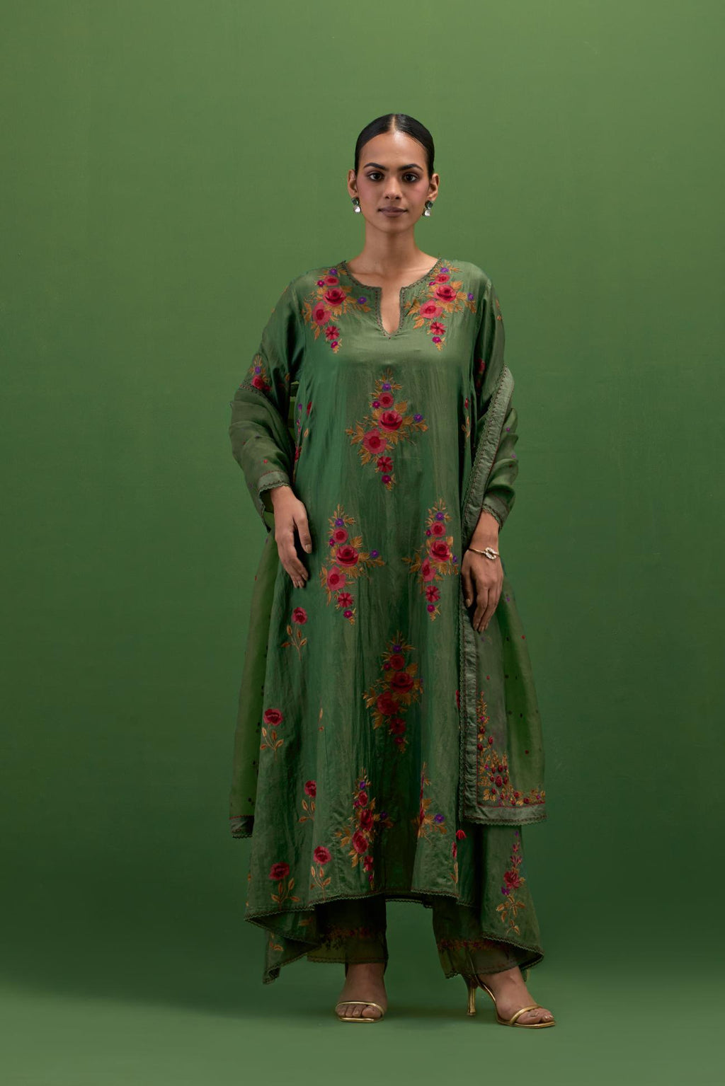 Brunswick green silk easy fit, asymmetric hem, panelled kurta set with all-over thread embroidered roses, highlighted with scalloped organza at the edges with contrast beads.