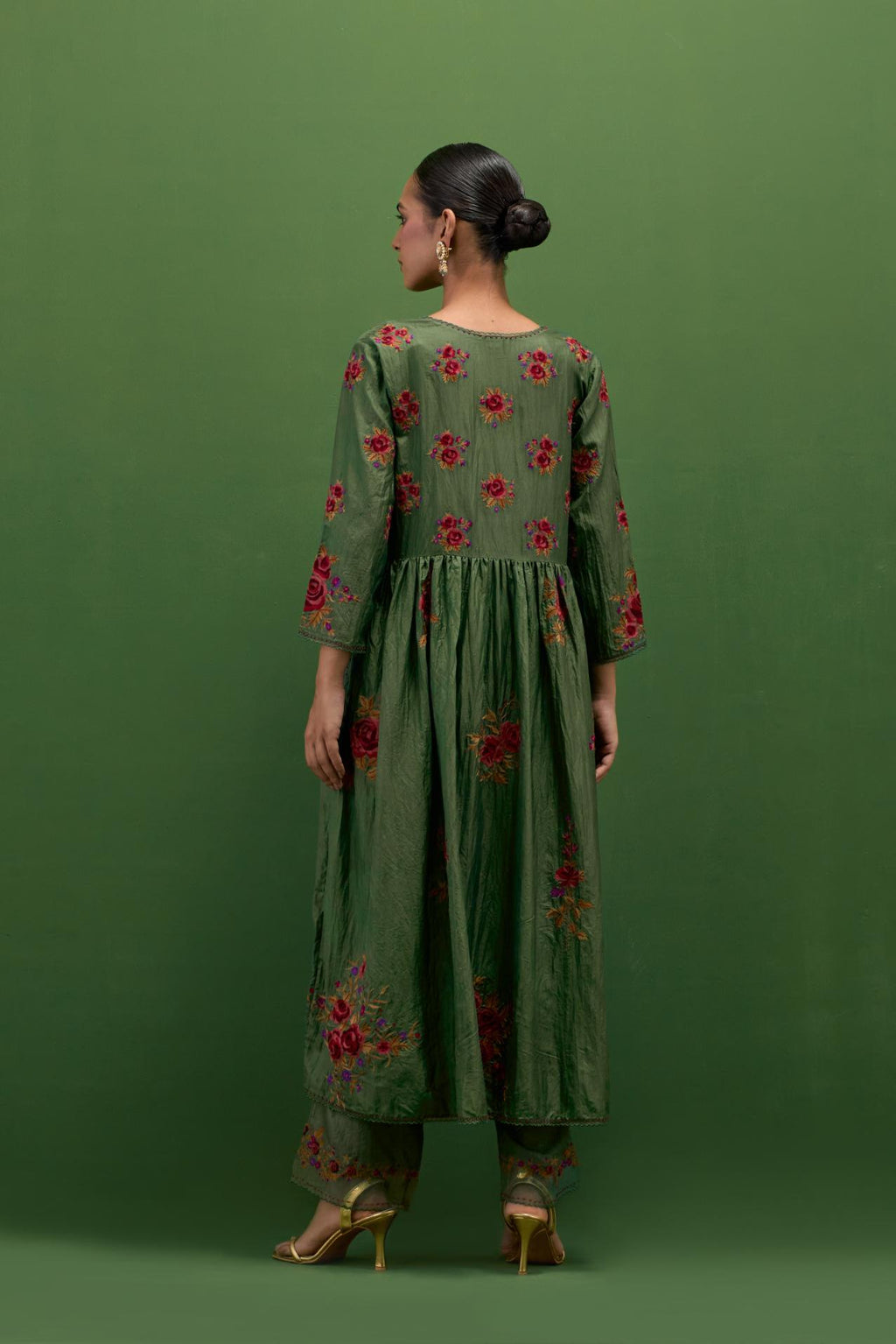 Brunswick green silk Kurta dress set with all-over assorted thread embroidery floral bunches.