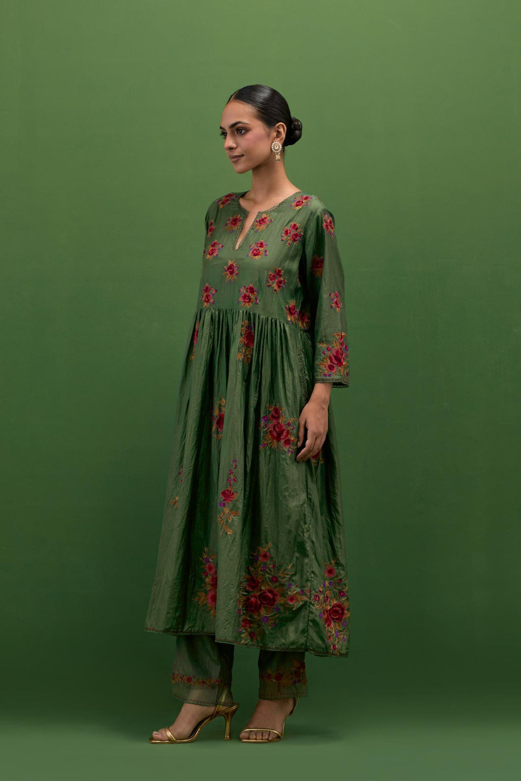 Brunswick green silk Kurta dress set with all-over assorted thread embroidery floral bunches.