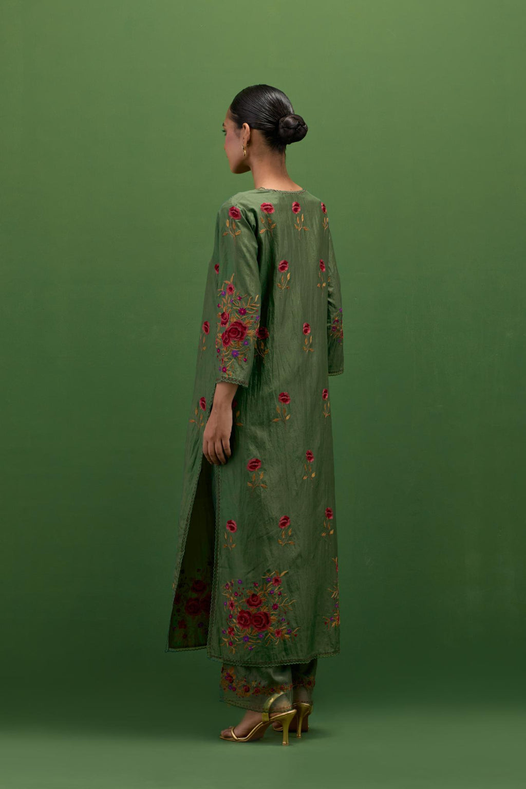 Brunswick green silk straight kurta set with all-over roses embroidered in thread and scalloped organza detail at the edges.