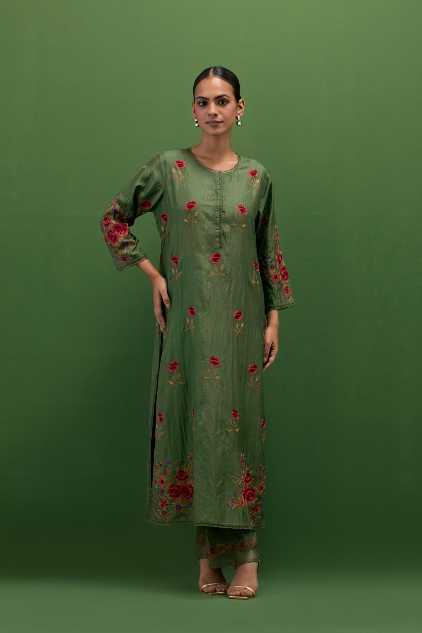 Brunswick green silk straight kurta set with all-over roses embroidered in thread and scalloped organza detail at the edges.