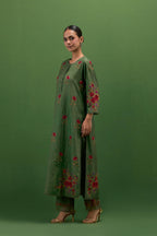 Brunswick green silk straight kurta set with all-over roses embroidered in thread and scalloped organza detail at the edges.