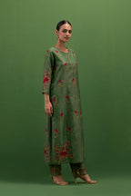 Brunswick green silk straight kurta set with all-over roses embroidered in thread and scalloped organza detail at the edges.
