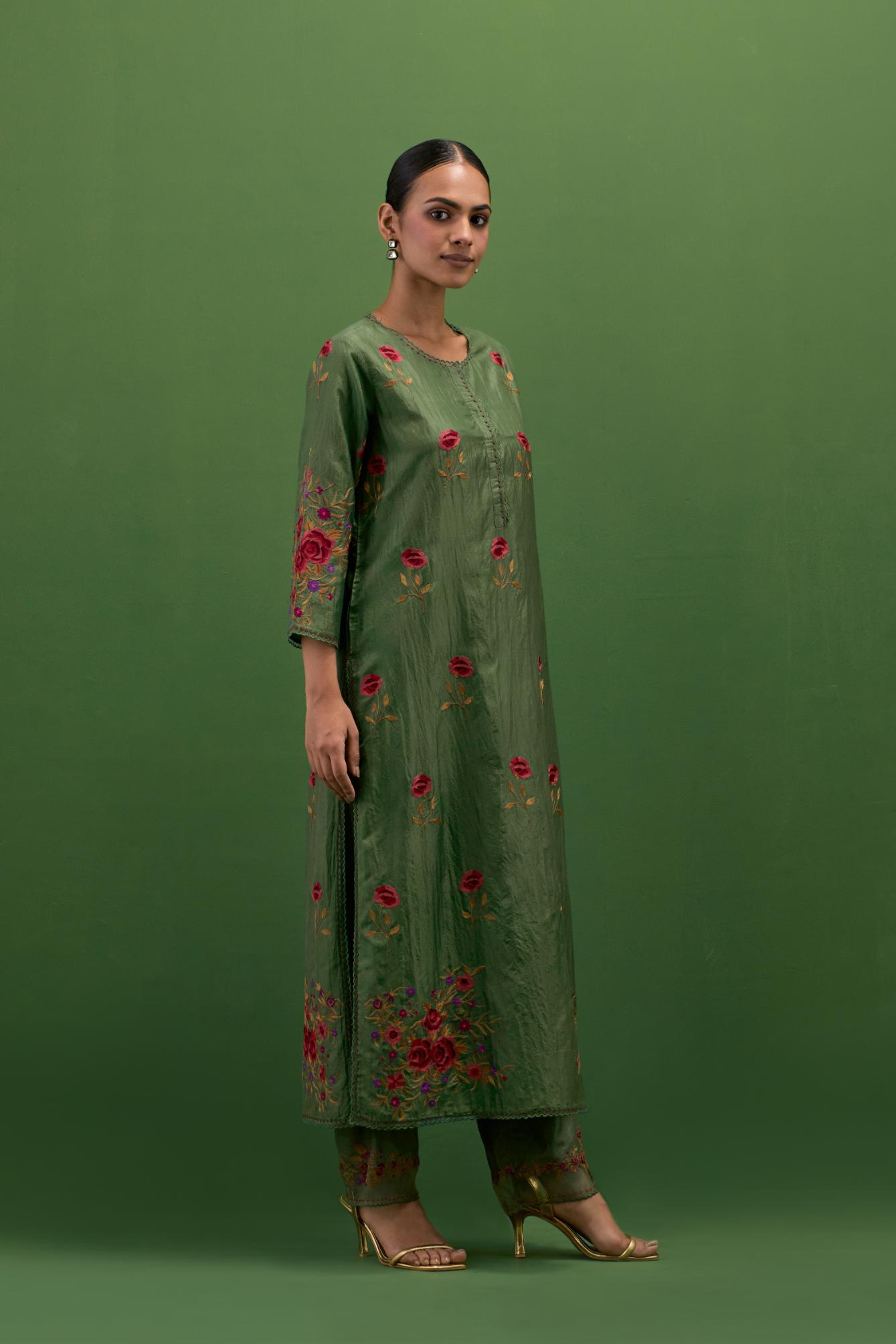 Brunswick green silk straight kurta set with all-over roses embroidered in thread and scalloped organza detail at the edges.