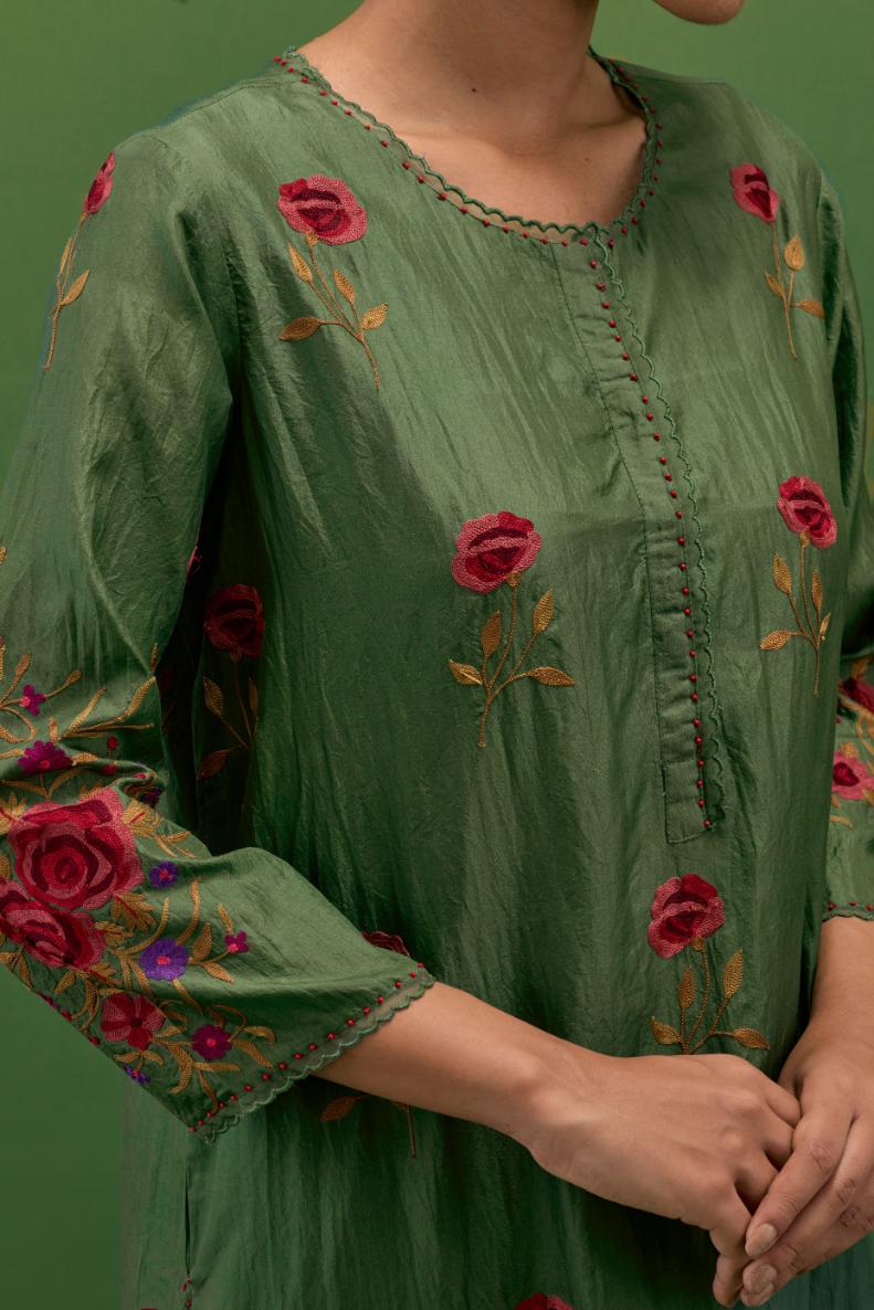 Brunswick green silk straight kurta set with all-over roses embroidered in thread and scalloped organza detail at the edges.