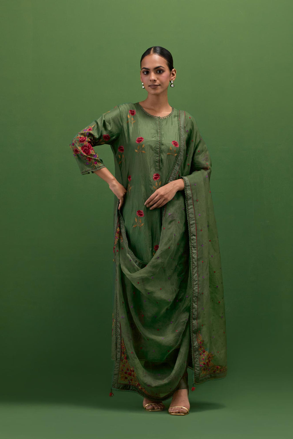 Brunswick green silk straight kurta set with all-over roses embroidered in thread and scalloped organza detail at the edges.