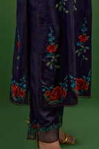 Midnight blue silk straight kurta set with all-over rose embroidery and scalloped organza detail at the edges.