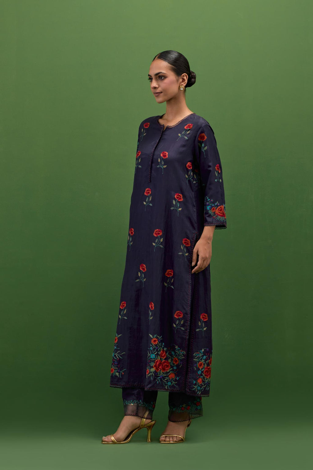 Midnight blue silk straight kurta set with all-over roses embroidered in thread and scalloped organza detail at the edges.