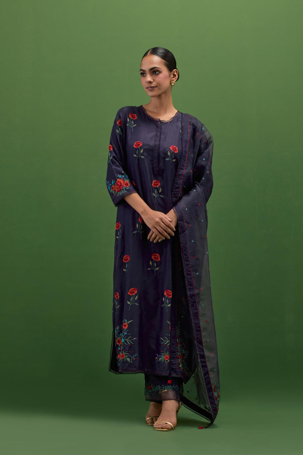 Midnight blue silk straight kurta set with all-over roses embroidered in thread and scalloped organza detail at the edges.
