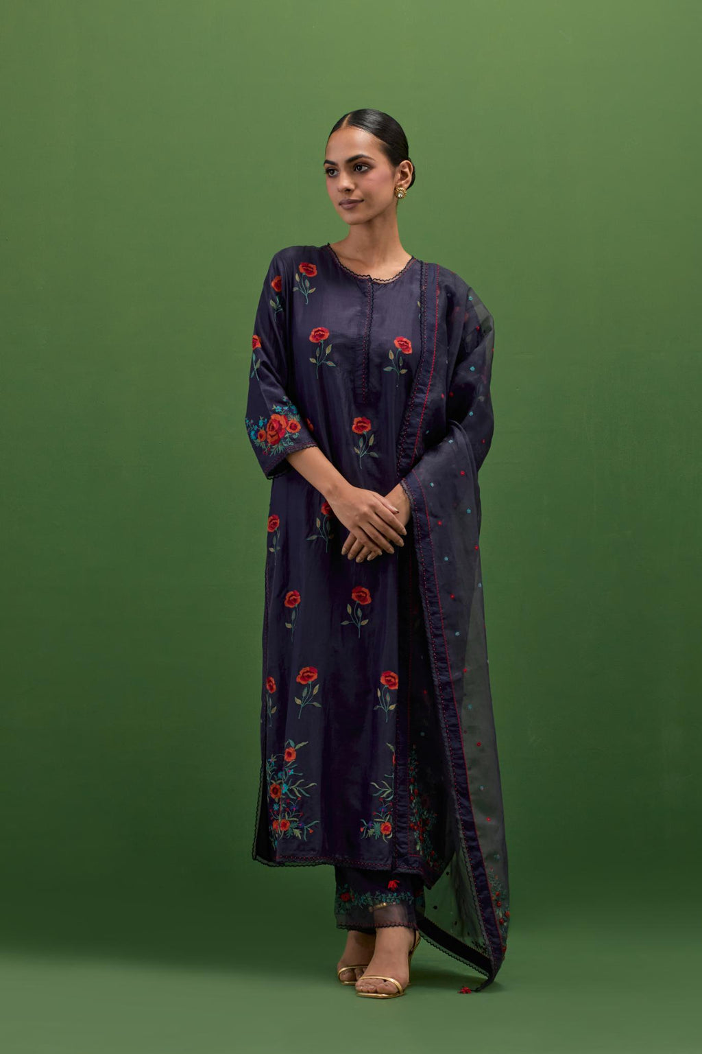 Midnight blue silk straight kurta set with all-over roses embroidered in thread and scalloped organza detail at the edges.