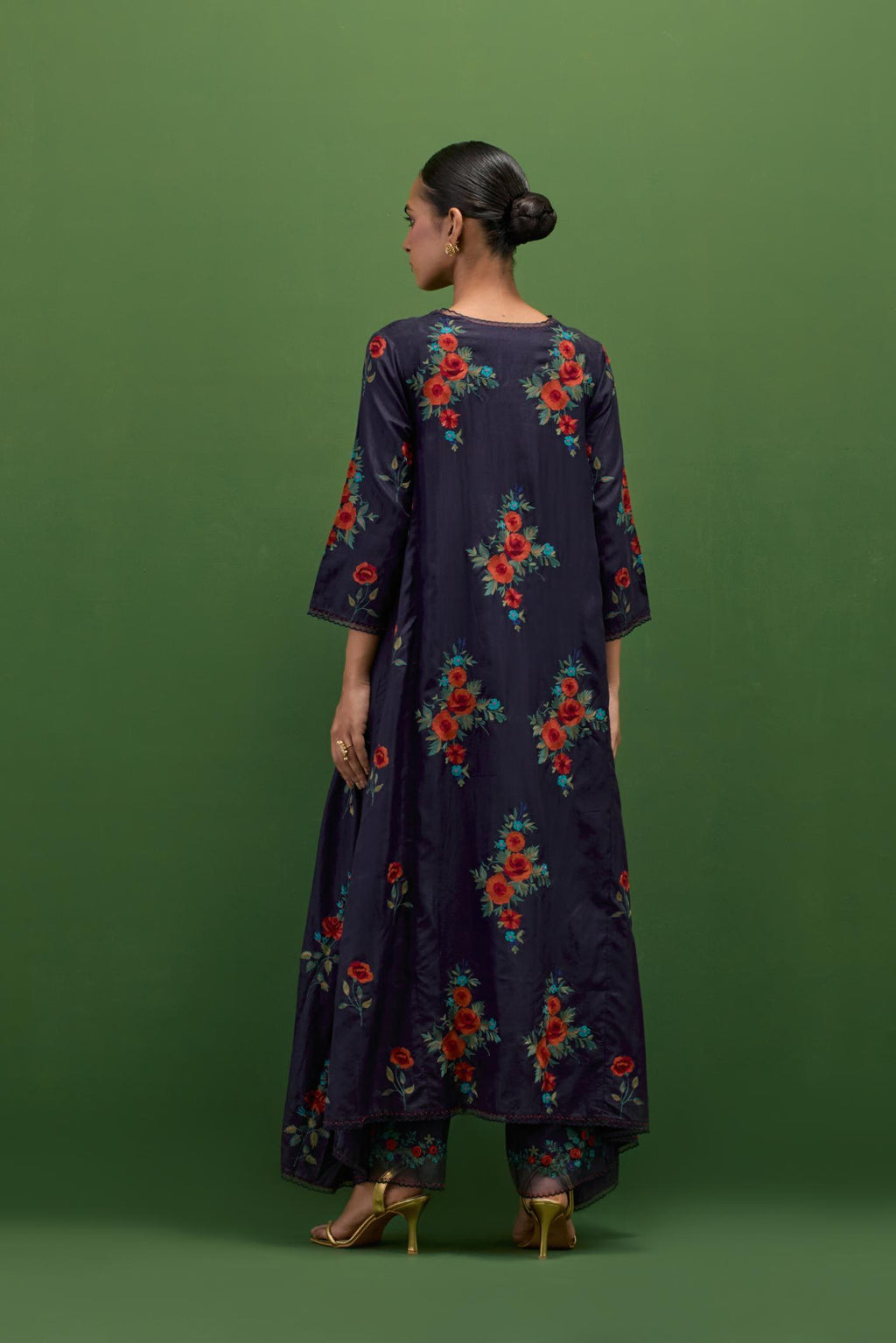 Midnight blue silk easy fit, asymmetric hem, panelled kurta set with all-over thread embroidered roses, highlighted with scalloped organza at the edges with contrast beads.