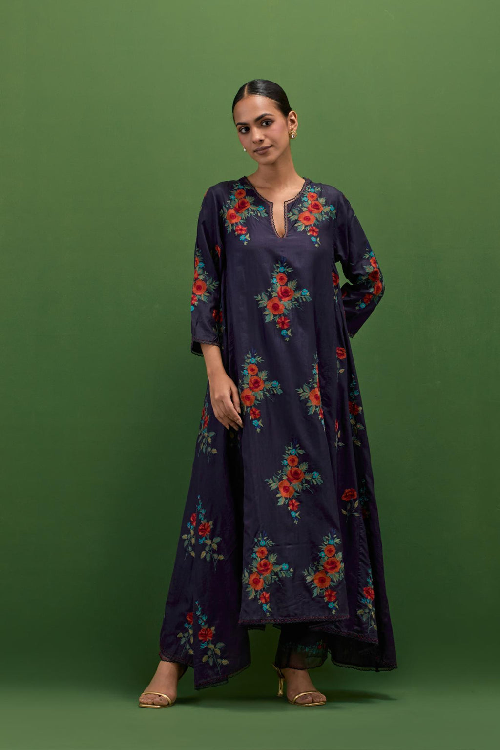 Midnight blue silk easy fit, asymmetric hem, panelled kurta set with all-over thread embroidered roses, highlighted with scalloped organza at the edges with contrast beads.