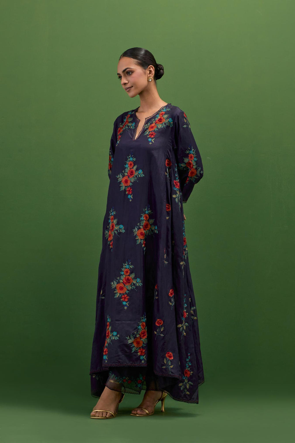 Midnight blue silk easy fit, asymmetric hem, panelled kurta set with all-over thread embroidered roses, highlighted with scalloped organza at the edges with contrast beads.