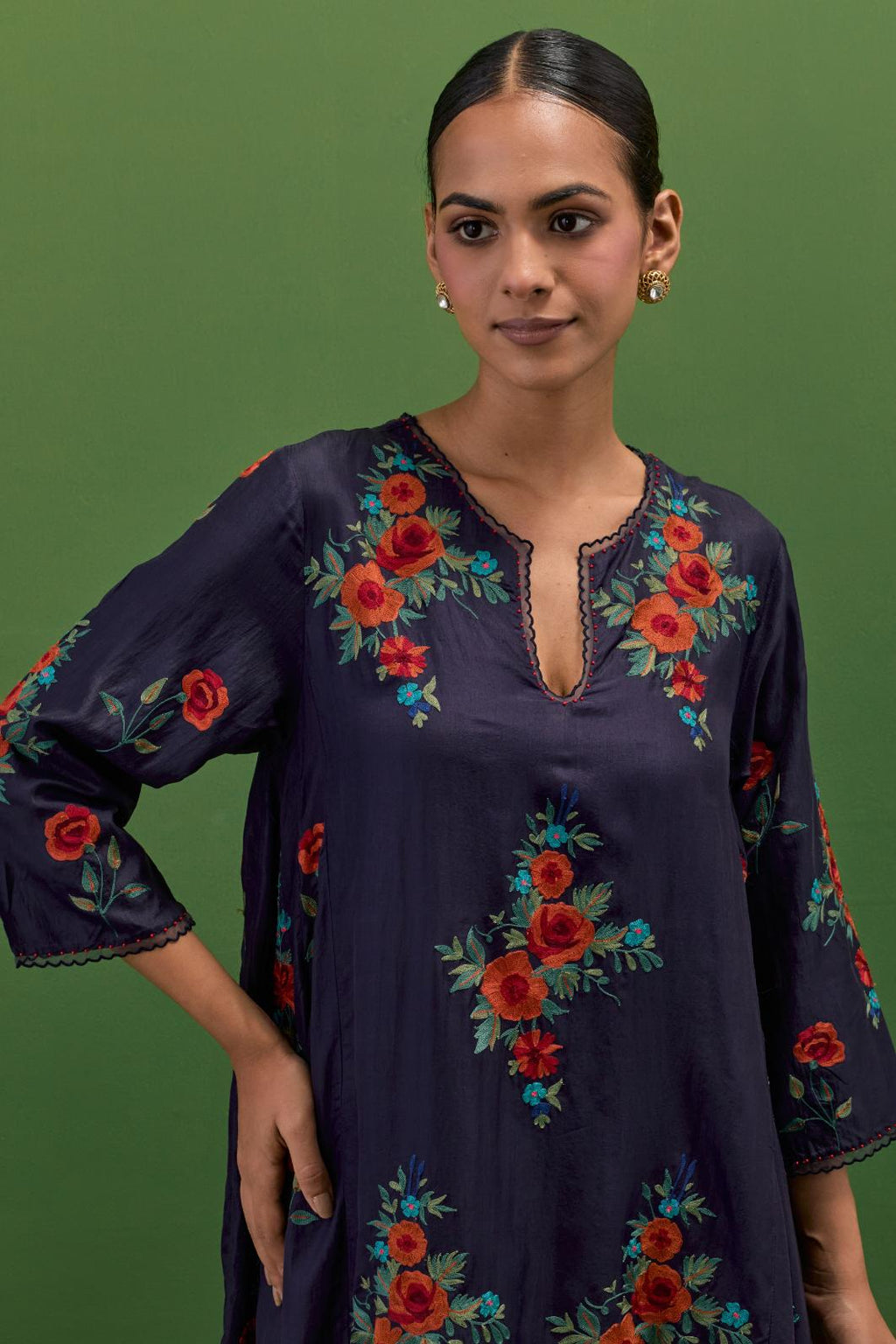 Midnight blue silk easy fit, asymmetric hem, panelled kurta set with all-over thread embroidered roses, highlighted with scalloped organza at the edges with contrast beads.