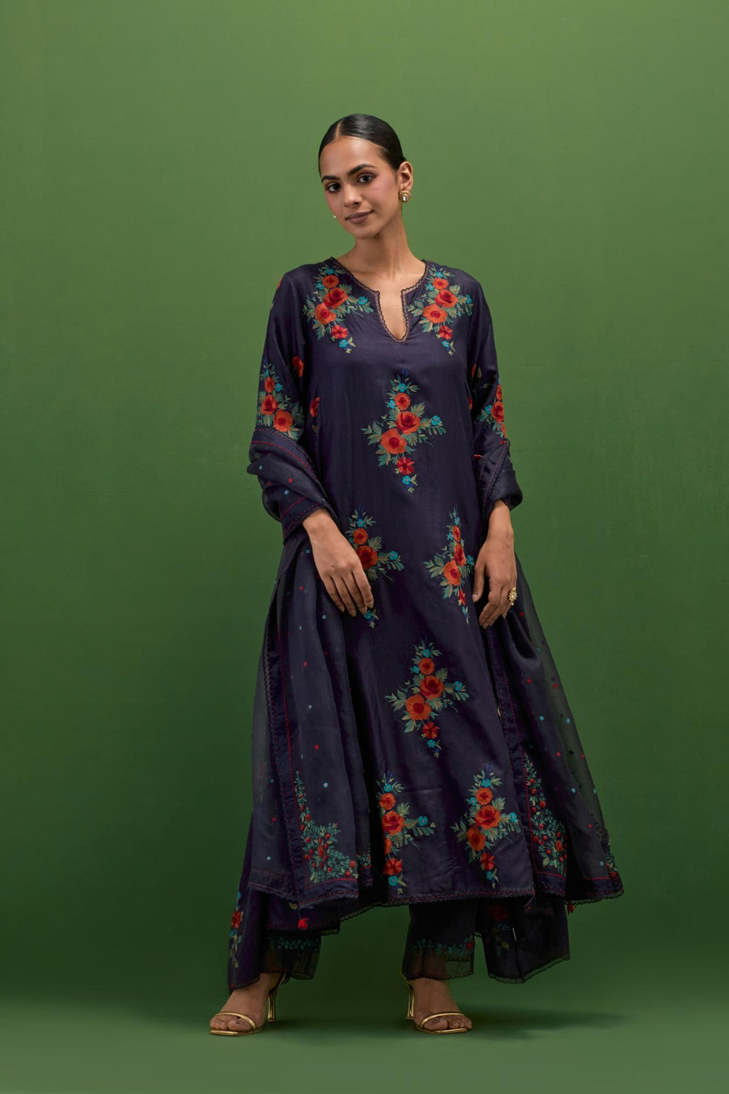 Midnight blue silk easy fit, asymmetric hem, panelled kurta set with all-over thread embroidered roses, highlighted with scalloped organza at the edges with contrast beads.