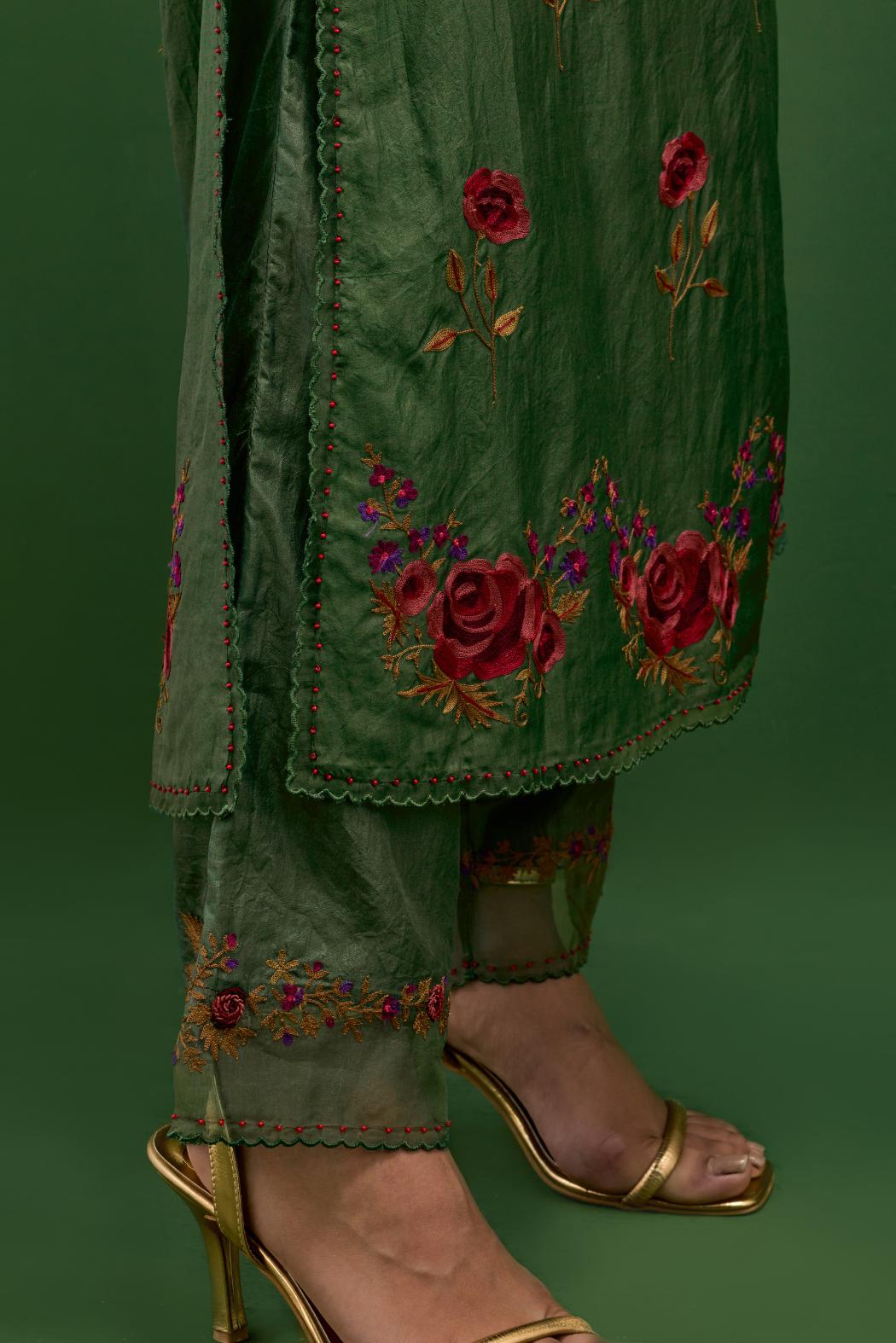 Brunswick green silk kurta set with pin tucks at yoke and all-over rose flower embroidery.