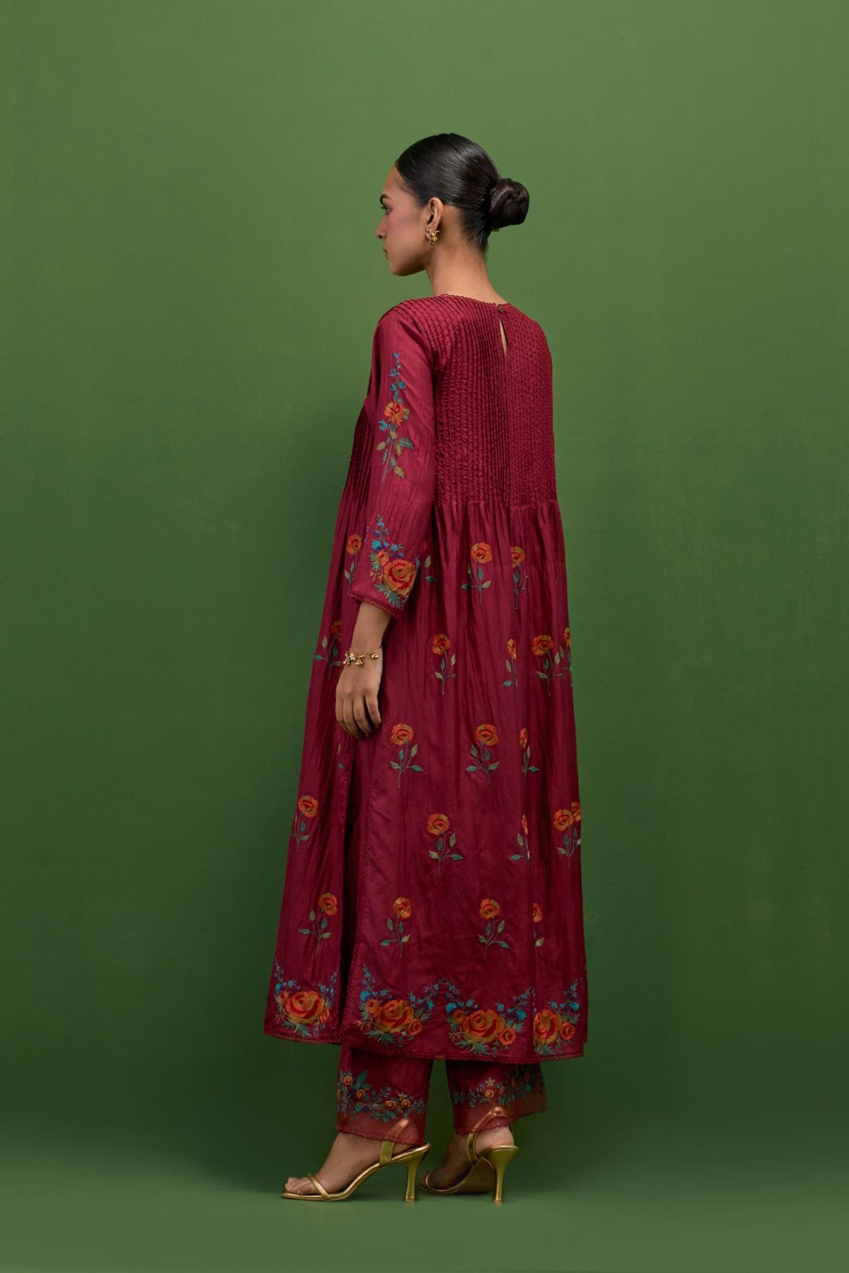Rosewood silk kurta set with pin tucks at yoke and all-over rose flower embroidery.
