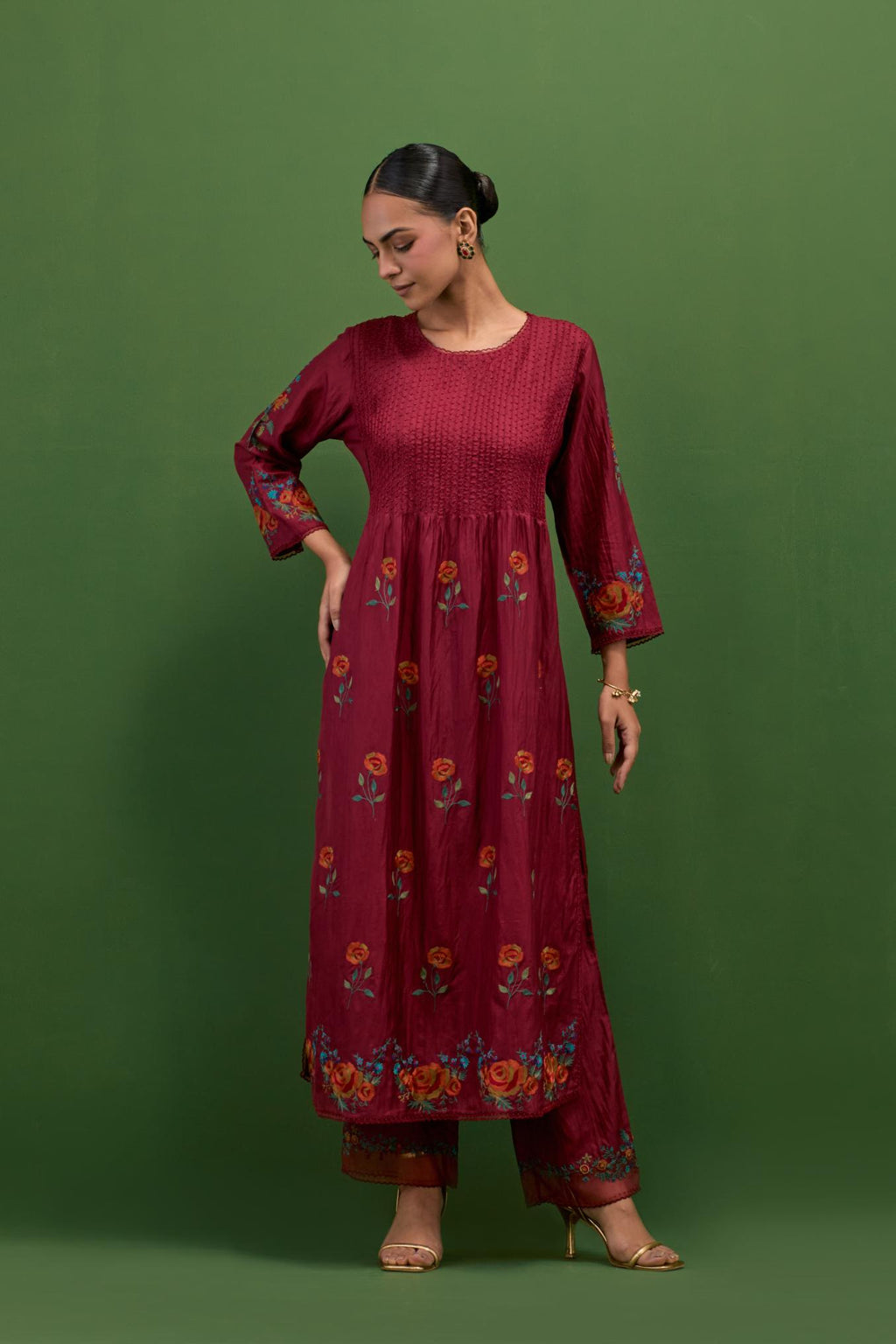 Rosewood silk kurta set with pin tucks at yoke and all-over rose flower embroidery.