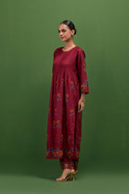 Rosewood silk kurta set with pin tucks at yoke and all-over rose flower embroidery.