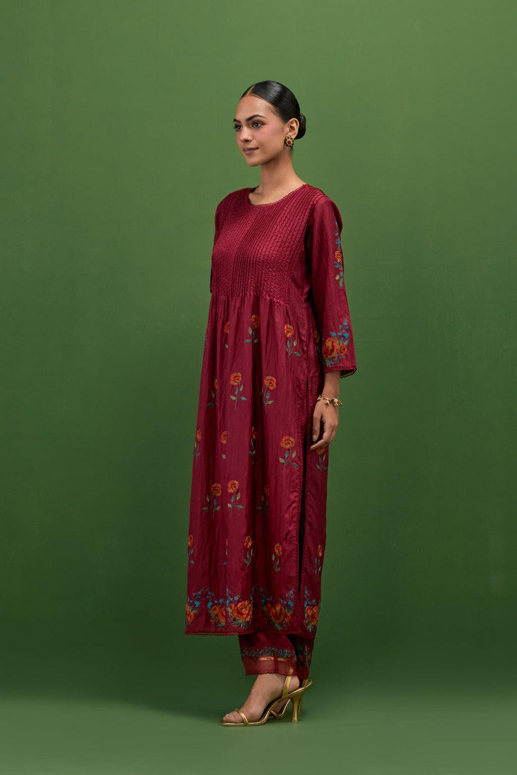 Rosewood silk kurta set with pin tucks at yoke and all-over rose flower embroidery.